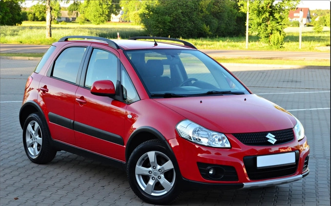 Suzuki SX4 cena 31900 przebieg: 93865, rok produkcji 2013 z Piastów małe 562